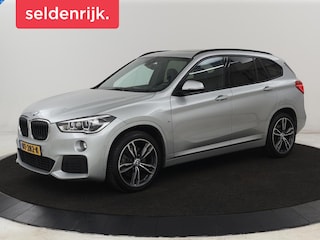BMW X1 sDrive20i M Sport | 74.900km NAP | Panoramadak | Leder | Stoelverwarming | Trekhaak | Head-Up | Sportstoelen | Full LED | Navigatie | Parkeerhulp | 19'' | Climate control | Cruise control