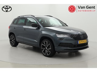 Skoda Karoq 1.5 TSI ACT Sportline Business | Trekhaak | Navigatie | Stoel-/stuurverwarming | 19 inch | CANTON | Keyless | Parkeersensoren voor/achter | Camera | Apple Carplay / Android Auto