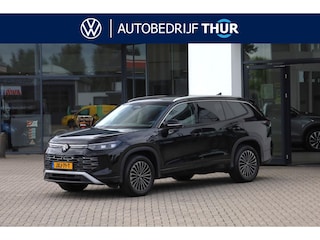 Volkswagen Tayron 1.5 eHybrid Elegance wegklapbare trekhaak leder / alcantara area view elektrische achterklep spiegel pakket navigatie IQ Matrix comfort telefoon laders 2 x travel assist ACC keys less acces & entry 18" LMV napoli privacy glas chroom pakket travel assist draadloos carplay