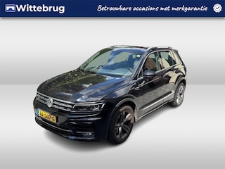 Volkswagen Tiguan 2.0 TSI 220pk 4Motion R-line Highline DSG Automaat Panoramadak / Lederen interieur / Trekhaak afn. / Navigatie / Camera  / El. verst. stoel