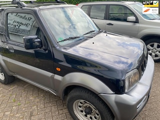 Suzuki Jimny 1.3 two-tone, zwart/grijs met uitzonderlijk weinig km, mooie auto van binnen en van buiten