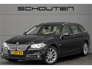 BMW 5-serie Touring 520i Modern Line Pano Trekhaak Leder Xenon 18"