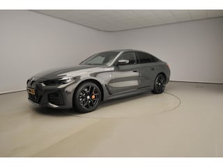 BMW i4 eDrive40 84 kWh SoH 93,4 | M Sport | Dravitgrau | Schuifdak | Camera