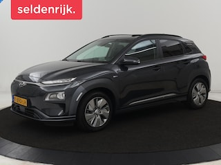 Hyundai Kona EV Limited 64 kWh | Stoelventilatie | Leder | Schuifdak | Head-Up | Warmtepomp | Trekhaak | Camera | Achterbankverwarming | Adaptive cruise | Navigatie | Full LED | Keyless | Digital Cockpit | Stoelverwarming