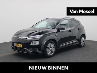 Hyundai Kona EV Fashion 64 kWh | Apple Carplay/Android Auto | Cruise Control | Climate Control | Achteruitrijcamera | Head-Up Display | Stoelverwarming | Lichtmetalen Velgen |
