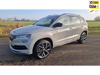 Skoda Karoq 1.5 TSI ACT Sportline Business, dealer onderhouden.