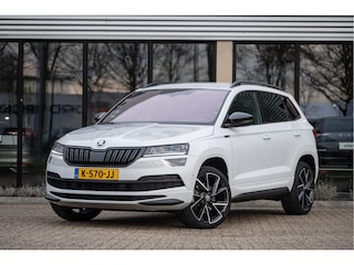 Skoda Karoq 1.5 TSI ACT Sportline Business | Trekhaak | Adapt. Cruise | CANTON | Camera | 19" | Winterpakket