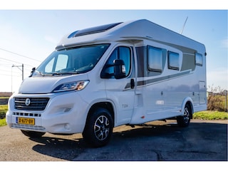 Carado T334 Half-integraal OMNISTOR | TREKH. | CAM. | DAKAIRCO | HEFBED | VASTBED | DOUCHECABINE | KOELVRIES | FIETSENDRAGER