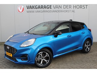 Ford Puma 1.0-125pk EcoBoost Mild-Hybrid ST-Line. Mooie luxe hoogzitter ! Slechts 9.500km ! Autm. airco, adapt. cruise control, stoel-, stuur- en voorraamverw., navigatie, telefoonvoorb., LM wielen, elektr. achterklep, LED verl., camera 360gr, pdc v+a etc.
