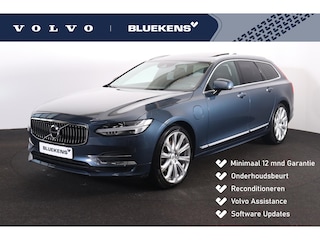 Volvo V90 T8 AWD Inscription - Luchtvering - Panoramisch schuif-/kanteldak - Intellisafe Assist/Surround - Head-up Display - Harman Kardon Audio - Nappaleder - Massagefunctie - Verwarmbare voorstoelen - Stoelventilatie - Getint glas - Trekhaak semi elektrisch inklapbaar - 20' LMV