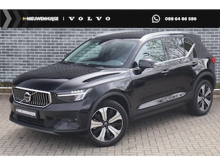 Volvo XC40 Plug-in hybrid T4 Plus Bright | Facelift | Lederen bekleding | Harman Kardon audio | Stoel- en stuurverwarming | Cruise control | LED koplampen | 19" velgen | Voorruitverwarming | Elektrische stoelverstelling | Climate control | Navigatie | Getint glas | Apple Carplay / Android Auto |