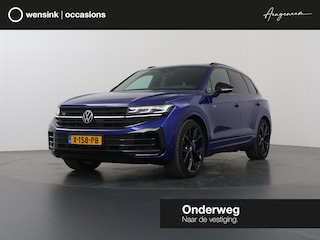 Volkswagen Touareg 3.0 TSi eHybrid 4MOTION R | Luchtvering | Panoramadak | Matrix Led IQ | Discover Pro Max | Comfort-Stoelen | Trekhaak | Stoelverwarming V + A | Nachtzicht-Assistent | Park Assist Pro | Connectivity-Pakket | Adaptieve Cruise Control |