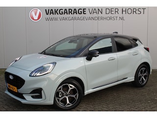 Ford Puma 1.0-125pk EcoBoost Mild-Hybrid ST-Line. Mooie luxe hoogzitter ! Slechts 9.900km ! Autm. airco, adapt. cruise control, stoel-, stuur- en voorraamverw., navigatie, telefoonvoorb., LM wielen, elektr. achterklep, LED verl., camera 360gr, pdc v+a etc.