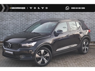 Volvo XC40 Plug-in Hybrid T4 R-Design | Lederen bekleding | Navigatie | Elektrische stoelverstelling | Stoel- en stuurverwarming | Climate control | Achteruitrijcamera | LED koplampen | Cruise control | Parkeersensoren voor + achter | Apple Carplay / Android Auto |