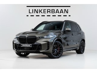 BMW X5 xDrive50e Hybride | Uniek | M Sport | Pano | H&K | Massage | Trekhaak | 22 inch | NL auto |