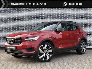Volvo XC40 Plug-in Hybrid T5 R-Design | Panoramadak | 20" velgen | Stoel- en stuurverwarming | 360 camera | Voorruitverwarming | Elektrische stoelverstelling | Navigatie | Cruise control | Parkeersensoren voor + achter | Apple Carplay / Android Auto | Draadloze telefoonlader |