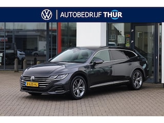 Volkswagen Arteon 1.4 TSI eHybrid R-Line Business+ NL auto 1e eigenaar dealeronderhouden wegklapbare trekhaak Panoramadak sfeerverlichting achteruitrijcamera privacy glas extra getint Design pakket assistentie pakket half leder r line in en exterieur 18" LMV sebring met 4 seizoenen banden elektrische achterklep door ons nieuw geleverd en onderhouden