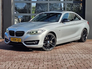BMW 2-serie Coupé 220i High Executive Sport | Automaat | Xenon | Leder | Stoelverwarming | Schuif/hef dak | Cruise |