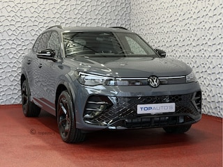 Volkswagen Tiguan 1.5 eHYBRID 272PK NW AUTO R-LINE PANO XL.NAVI BLACK.STYLE 360.CAM ELEK.KLEP MATRIX.LED 20''LMV MASSAGE PHEV PLUG IN HYBRID "Volkswagen rijden begint bij Topautos.nl – 75 topmodellen direct op voorraad!"
