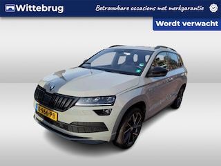 Skoda Karoq 1.5 TSI ACT Sportline Business / AUTOMAAT/ TREKHAAK/ PANO/ DIGITAL DASH/ NAVI/ PARK. SENSOREN + CAMERA/ 19"LMV