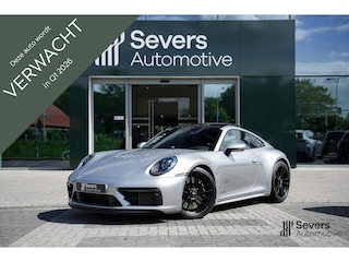 Porsche 911 3.0 Carrera 4 GTS | Elektrisch glazen schuif-/kanteldak | 18-voudig Sportstoelen met memory | BOSE Surround-Sound-System | Porsche Active Suspension Management | SportDesign Side Skirts | ParkAssistent inclusief achteruitrijcamera |