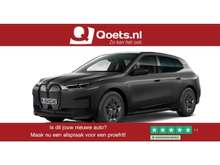 BMW iX xDrive40 Executive 77 kWh Trekhaak - Panoramadak - Driving/Parking Assistant Professional - Luchtvering - Comfort Access - Soft close - Getinte Ruiten - Hemelbekleding in Anthrazit -