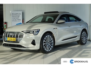 Audi E-tron 50 quattro Business edition Plus 71 kWh | Adapt. Cruise | Trekhaak | Schuifdak | Leder | Stoelverwarming | Memory | Ambient light | Carplay | Navi | Elektr. klep
