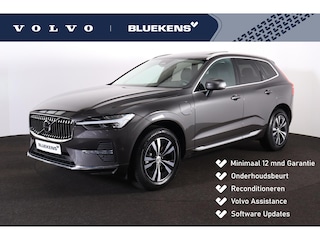 Volvo XC60 T6 Plug-in hybrid AWD Essential Edition Bright Panorama/schuifdak - IntelliSafe Assist & Surround - Parkeercamera achter - Verwarmde voorstoelen, stuur & achterbank - Parkeersensoren voor & achter - Draadloze tel. lader - Standkachel - Extra getint glas - Elektr. inklapbare trekhaak - 18' LMV