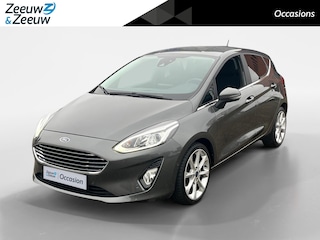 Ford Fiesta 1.0 EcoBoost Titanium | Dealer onderhouden | Automaat | Winter pack | Parkeersensor voor en achter | Achteruitrijcamera | 17" lichtmetalen velgen | Navigatie | Apple carplay & Android auto | Cruise control | Privacy glas |