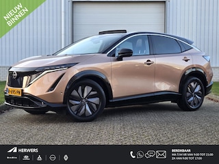 Nissan Ariya Evolve 91 kWh / Panoramadak / 360 Graden Camera / Adaptief Cruise Control / Elektrisch Verstelbare Stoelen met Geheugen / Achterbank Verwarming / Stoel & Stuurverwarming / Stoel Verkoeling / Elektrische Achterklep / 1e Eigenaar / Dealer Onderhouden /