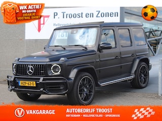Mercedes-Benz G-klasse 63 AMG Manufaktur/Night pakket/Magno matt/Panoramadak/Burmester/Sfeerverlichting/Entertainment schermen/Akrapović/AMG active ride control/Elektrisch verstelbare stoelen met memory + massage/Stoel verwarming + koeling/360° camera/voorruitverwarming/IWC/Ala