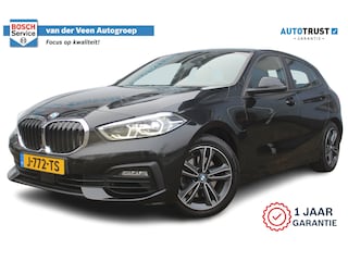 BMW 118i High Executive | Incl. 12 maanden Garantie | 1e Eigenaar | Panorama dak | Stoelverwarming | Trekhaak | Parkeersensoren V+A | Climate controle | Navigatie | Cruise controle | Lederen bekleding | Keyless start | Apple CarPlay/Android Auto | Winterset met LMV |