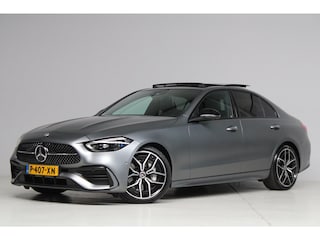 Mercedes-Benz C-klasse 180 AMG Line Night Pakket Magno Grey | panoramadak | laser led | elek. stoelen |dodehoek detectie | NL auto
