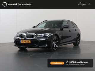 BMW 3-serie Touring 330e xDrive | M-Sport | Panoramadak | HUD | Curved Display | Ele.verstelbare stoelen + Geheugen | Camera | Apple CarPlay/Android Auto | Standkachel | Adaptieve Cruise Control | BMW LED |