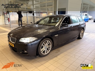 BMW 5-serie Touring 520i M Sport Edition High Executive I NL-Auto I leder I 184 PK I M-pakket I 18" I 2de eig I