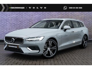 Volvo V60 T6 Plug-in hybrid AWD Essential Bright | Trekhaak | Lederen bekleding | 19" velgen | Google Maps navigatie | Apple Carplay / Android Auto | LED koplampen |