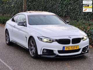 BMW 4-serie Coupé M Sprt Schuifdak Coupé Apple CarPlay Nap NL High Executive F33 M4 uitlaat Spoiler