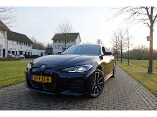 BMW i4 eDrive35 High Executive 70 kWh | Harman Kardon | Head-Up | LED | Schuif/Kanteldak | Adaptive Cruise | Leder |
