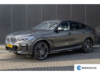 BMW X6 xDrive40i High Executive HUD | H&K | Pano | Luchtvering | 360 Camera | Stuurverwarming | Memory seats | Trekhaak | Adapt. Cruise Control + Zelfsturende functie