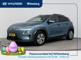 Hyundai Kona EV PREMIUM 64 kWh | 3- FASE | NAVI | CLIMA | ADAPT. CRUISE | CAMERA | HUD | LEDER | STUUR- & STOELVERWARMING | WARMTEPOMP | PRIVACY GLASS | WLTP 481 KM! |
