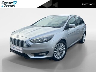 Ford Focus Wagon 1.0 Titanium | Achteruitrijcamera | Voorruitverwarming | Navigatie | Reservewiel | 12 maanden garantie! |