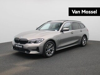BMW 3-serie Touring 320e Business Edition Plus | Automaat | LMV | Navigatie | Schuifdak | Stoel verwarming | Virtual cockpit | Half leder | Parkeer sensoren | Elec. achterklep | Virtual cockpit | Camera | Climate control | Cruise control | DAB |