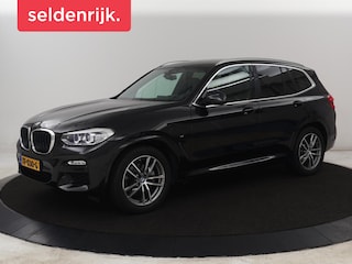 BMW X3 xDrive20i High Executive | M Sport | 1e eigenaar | Head-Up | Leder | Trekhaak | Stoelverwarming | Harman/Kardon | Camera | Keyless | Adaptive Drive | Sfeerverlichting | Full LED | Sportstoelen