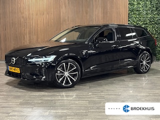 Volvo V60 T6 AWD Recharge Ultra Dark | Trekhaak | Schuifdak | Head-Up Display | Harman Kardon | Adaptieve Cruise Control | Stoelverwarming voor+achter | Stuurwielverwarming | Full LED Meesturende koplampen | Parkeercamera | Pilot Assist | BLIS Dode Hoek Detectie | Elektrische voorstoelen geheugen | Lederen bekleding | Zitting verlenging voorstoelen | Lederen dashboard | 18 Inch | Google Infotainment | Keyless Drive | Parkeersensoren voor+achter | Privacy Glass | Elektrisch bedienbare achterklep | DAB Radio | Apple Carplay/Android Auto | Volvo On Call met mobiele App functie | Onyx Black Metallic |