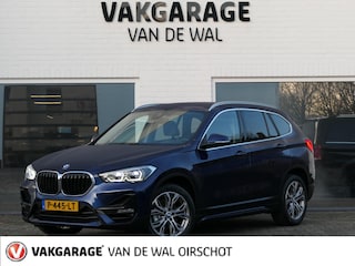 BMW X1 sDrive18i High Executive | Orange edition | Trekhaak | Achteruitrijcamera | Sport stoelen | LED | Elektrische achterklep | Stoelverwarming | Climate Control