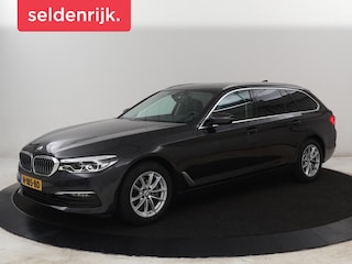 BMW 520i High Executive | Panoramadak | Leder | Trekhaak | Stoelverwarming | Camera | Live Cockpit | Park Assist | Carplay | Full LED | Navigatie | Climate control | Cruise control