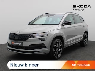 Skoda Karoq 1.5 TSI ACT Sportline Business 150PK DSG Trekhaak, Canton Audio, 19" LM Velgen, Elektr. Achterklep, Keyless, Adaptieve Cruise Controle, Achteruitrijcamera, Side Assist, Stoelverwarming, Voorruitverwarming