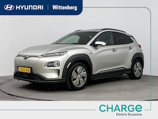 Hyundai Kona EV PREMIUM 64 kWh | 3- FASE | NAVI | CLIMA | CRUISE | CAMERA | HUD | LEDER | STUUR- & STOELVERWARMING | WARMTEPOMP | PRIVACY GLASS | WLTP 481 KM! |