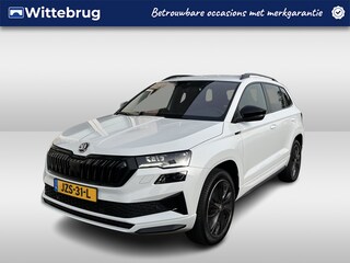 Skoda Karoq 1.5 TSI ACT Sportline / TREKHAAK/ STUUR+STOELVERWARM.V+A/ PARK.SENSOR.V+A/ CAMERA/ DCC/ SMARTLINK/ ACC/ KEYLESS/ NAVI/ RIJ-MODI/ CLIMA/ DAB/ LED/ DIGITAL DASH/ ISOFIX/ 18'' LMV
