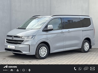 Volkswagen Transporter Caravelle 32 L1H1 Life 64 kWh Automaat / NIEUW/ Fabrieksgarantie tot 12-2027 / 8 Persoons / Stone Gray / Warmtepomp / Apple Carplay/Android Auto / Licht en zicht-pakket / Keyless entry / draadloze telefoonlader /